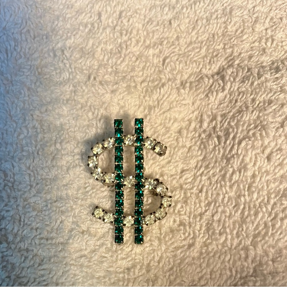 Rhinestone Dollar Sign Brooch in Emerald & Clear